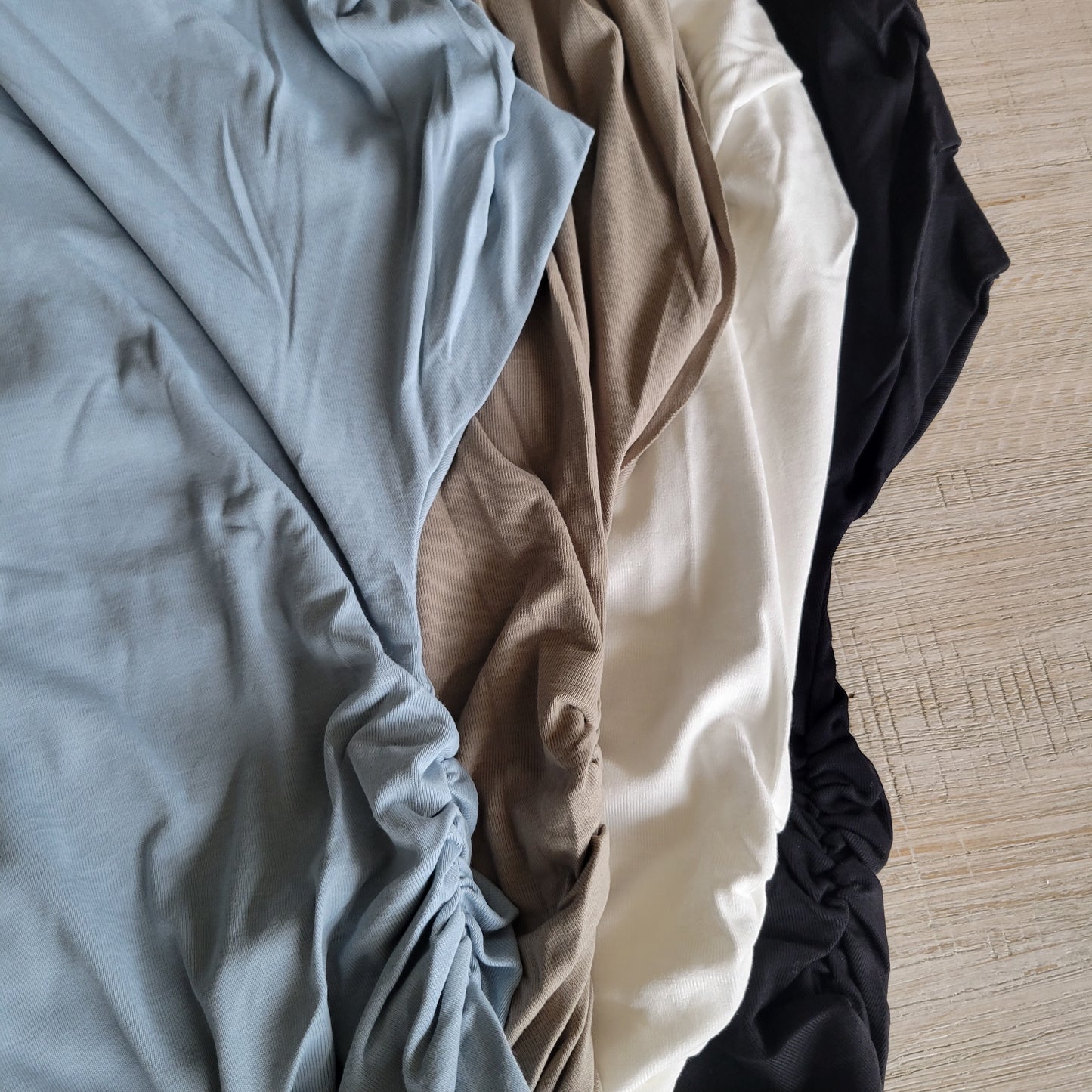 ASYMETRICAL NECK LINE RUCHED KNIT TOP BLACK