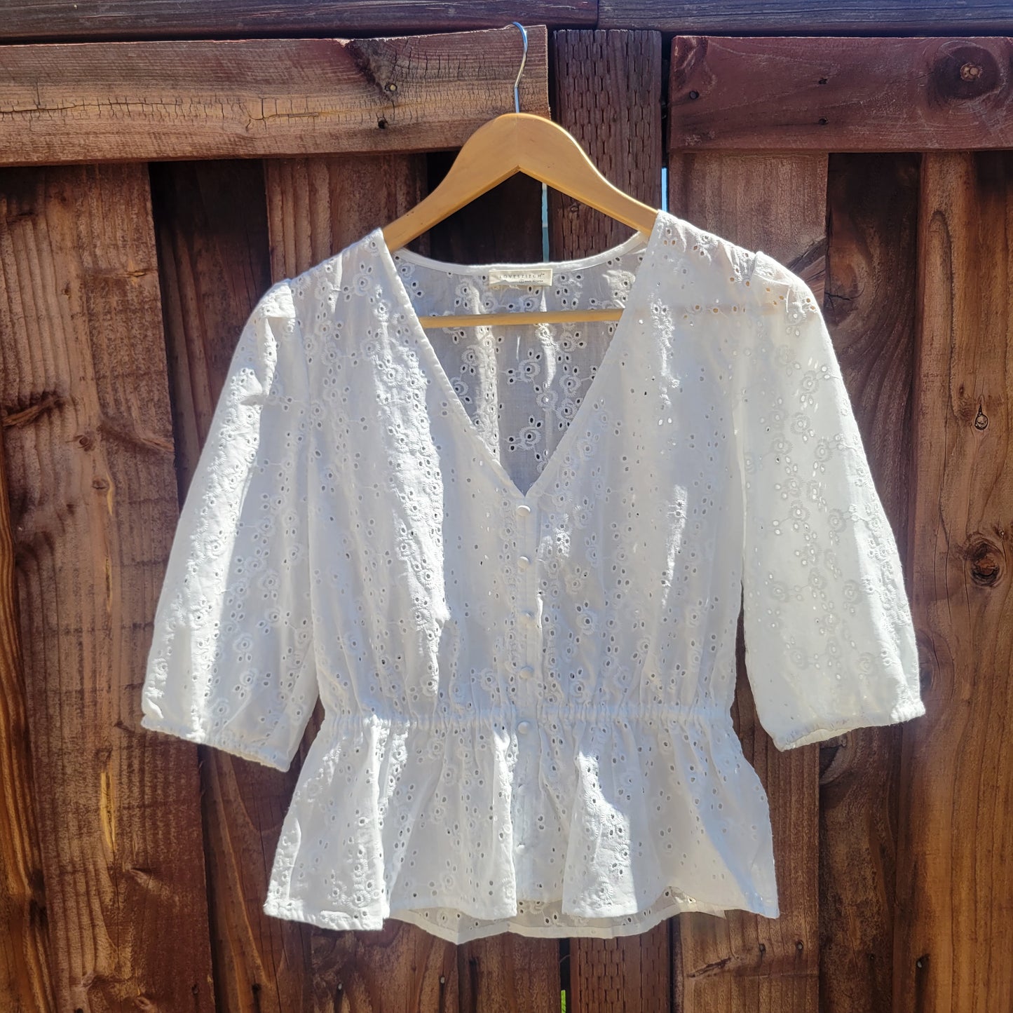 Floral Eyelet Puff Sleeve Peplum Top