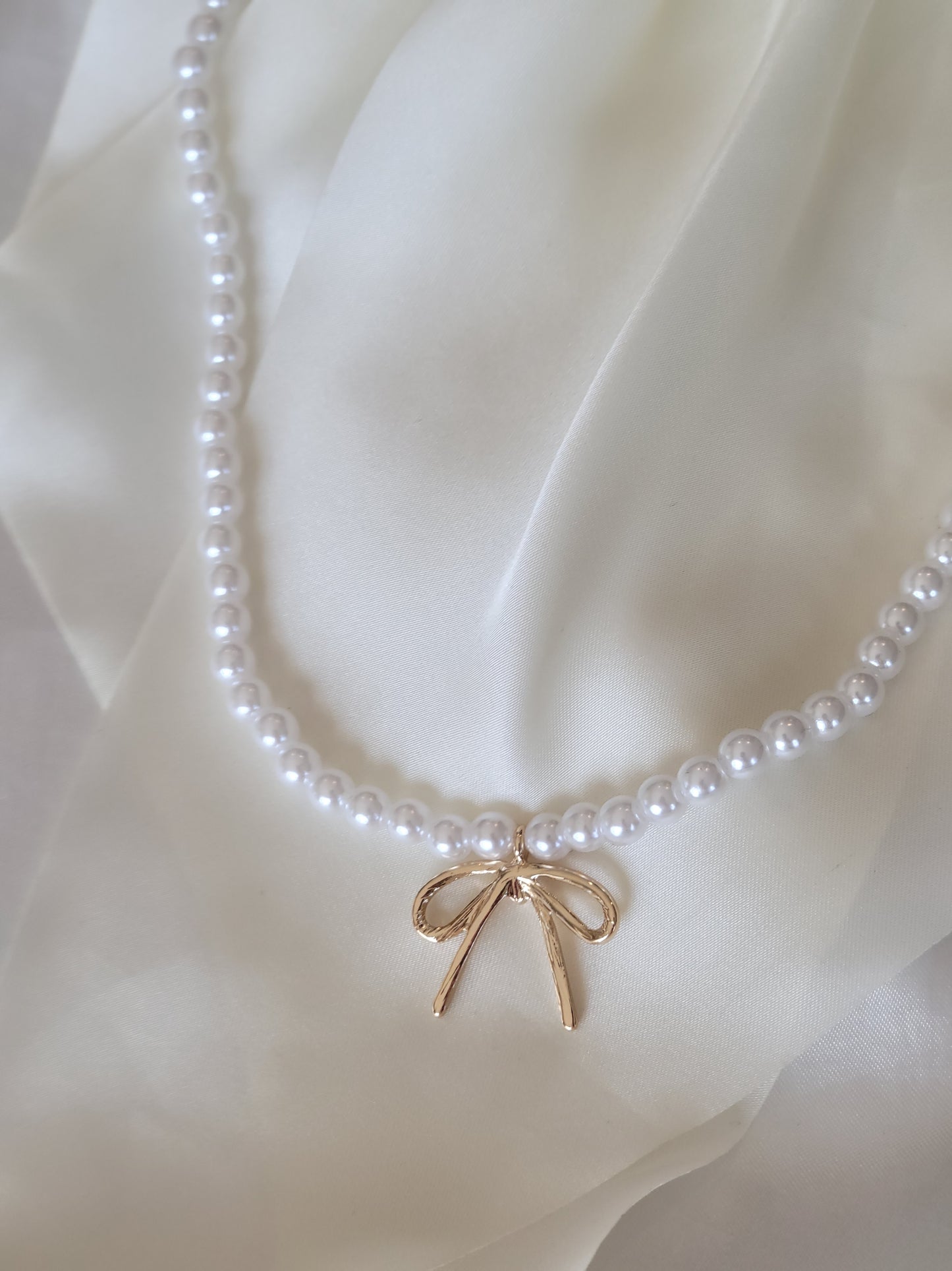 PEARL CHAIN BOW CHARM NECKLACE