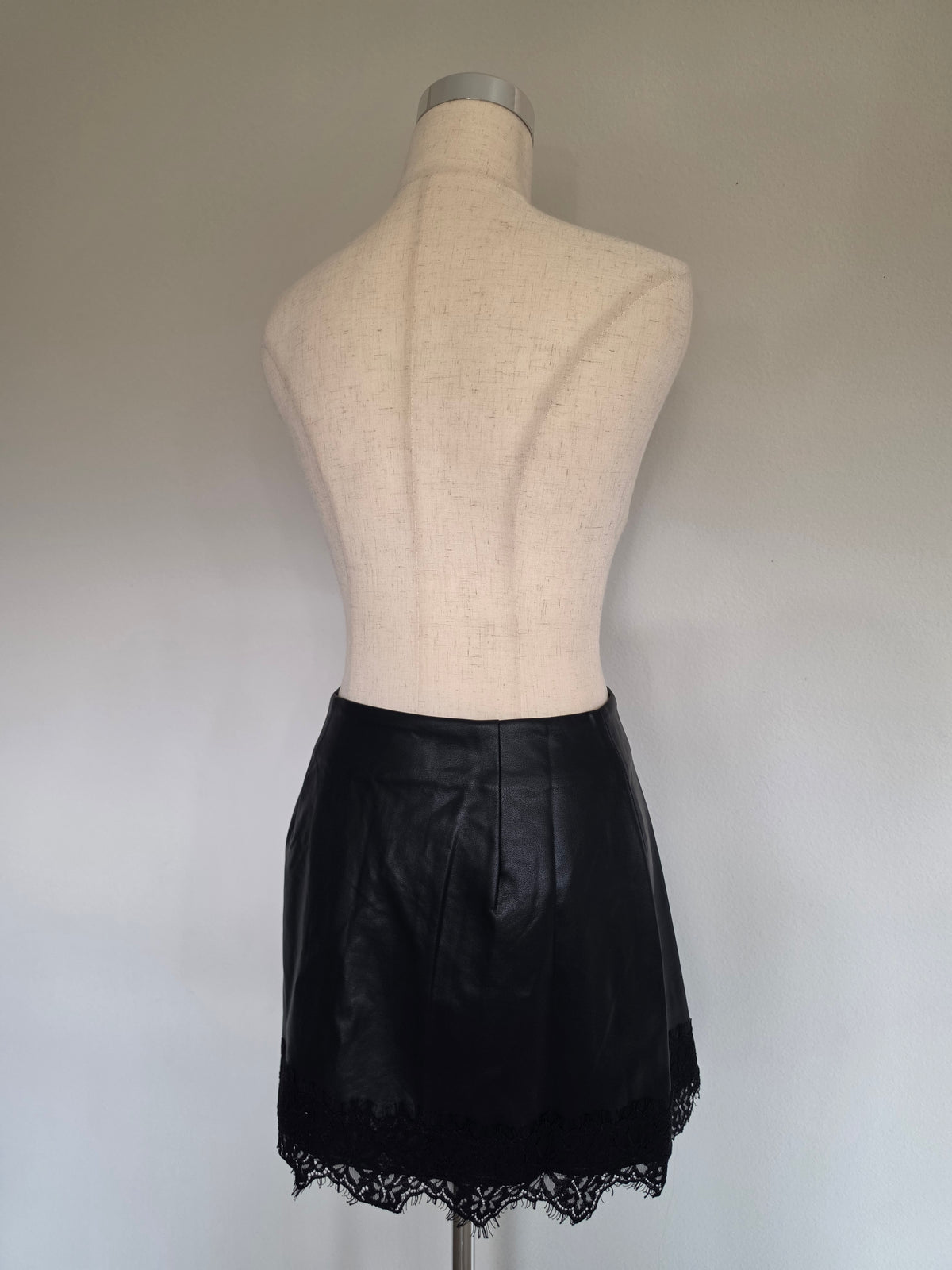 High-waisted Faux Leather Lace Trim Hem Mini Skort