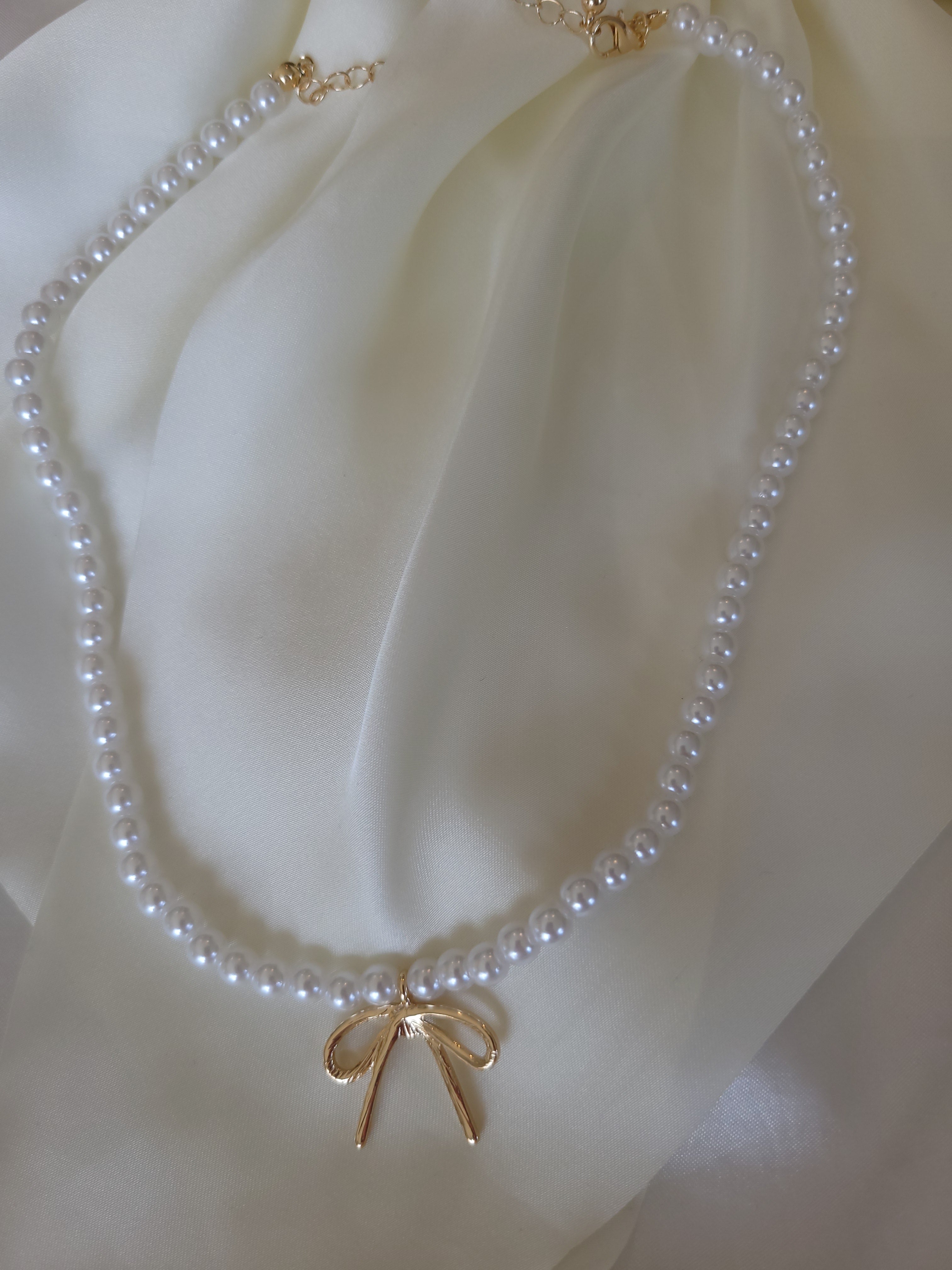 PEARL CHAIN BOW CHARM NECKLACE