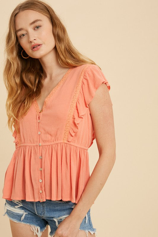 LACE INSET RUFFLED BUTTON CORAL TOP