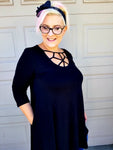 Not your basic curvy tunic  top in black