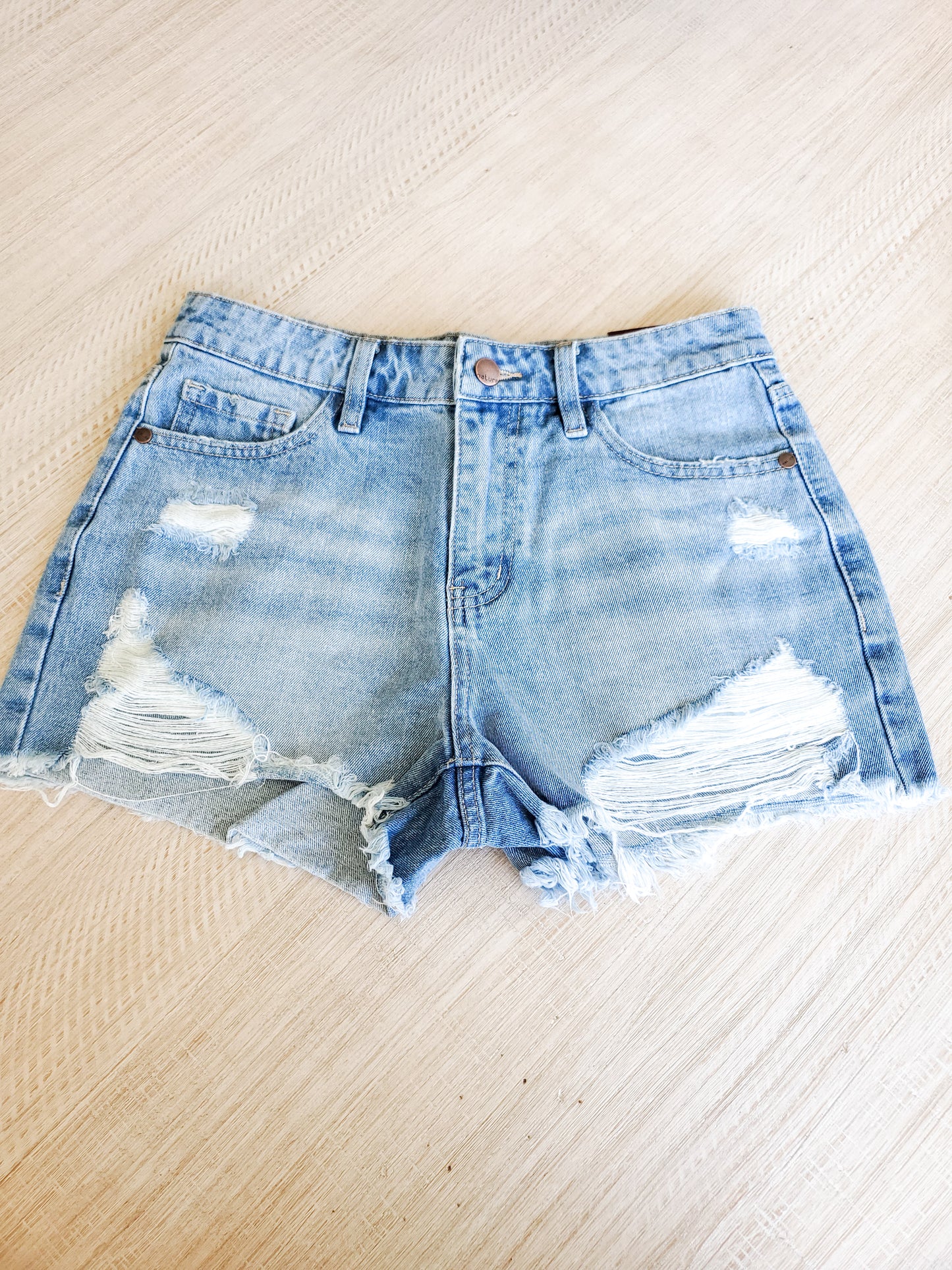 Distressed Light Wash Jean Shorts