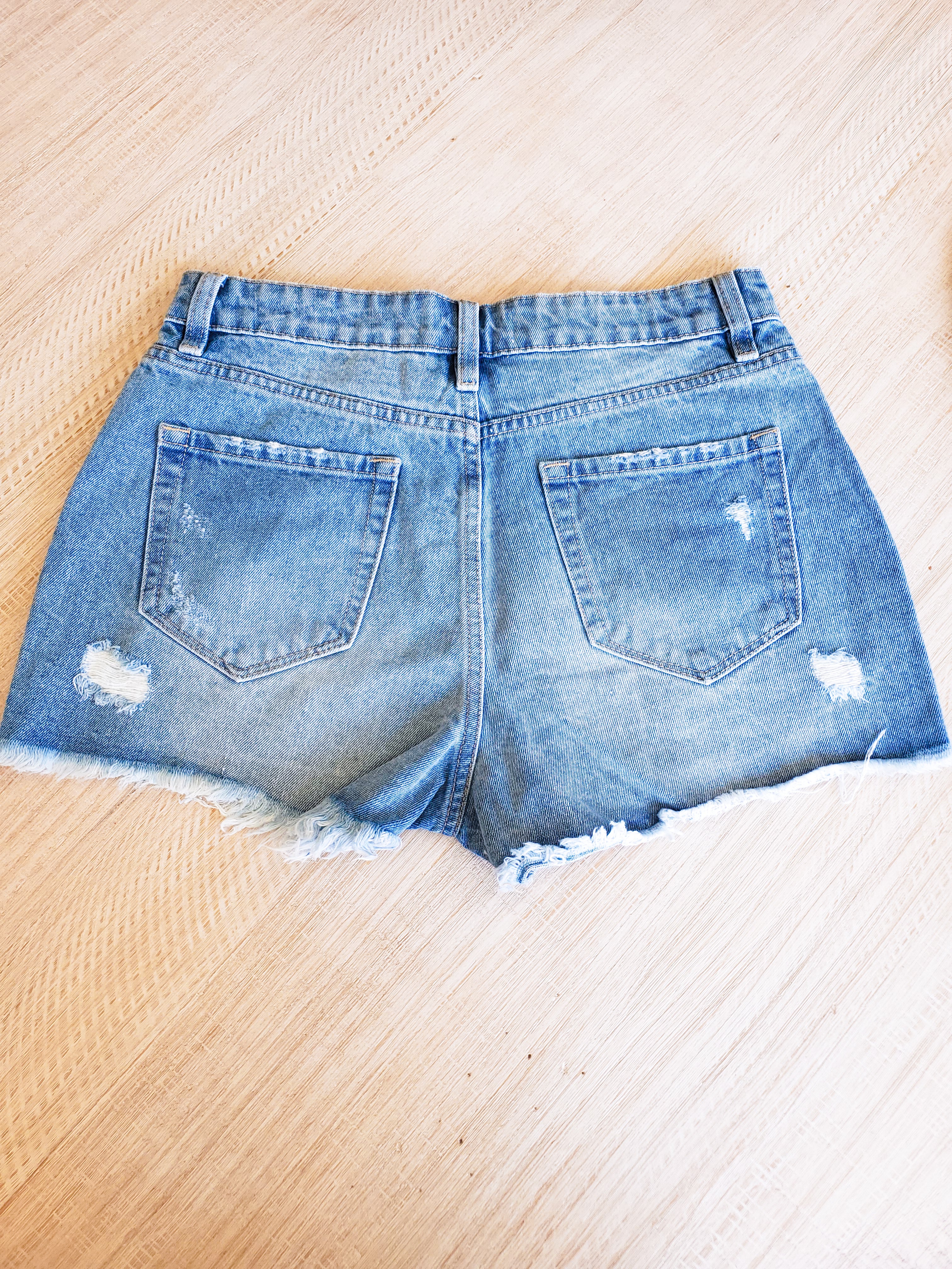 Distressed Light Wash Jean Shorts