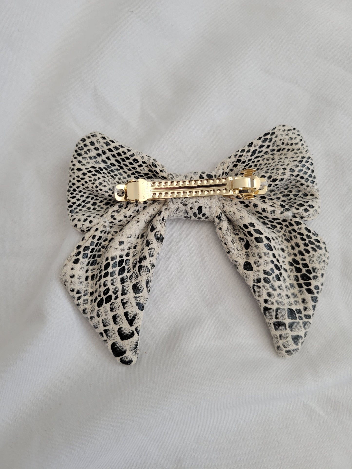 Snake print bow hair clip