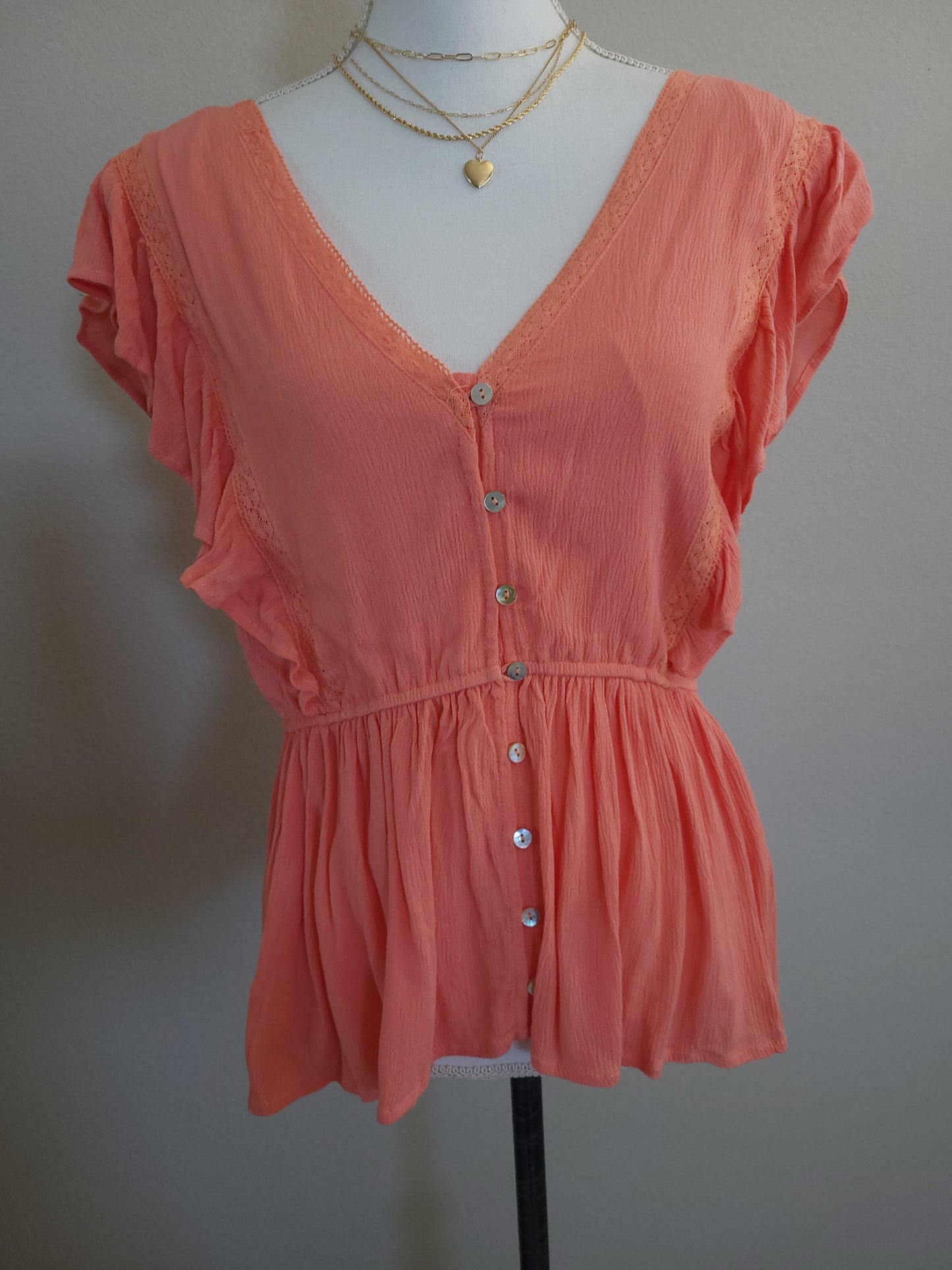 LACE INSET RUFFLED BUTTON CORAL TOP