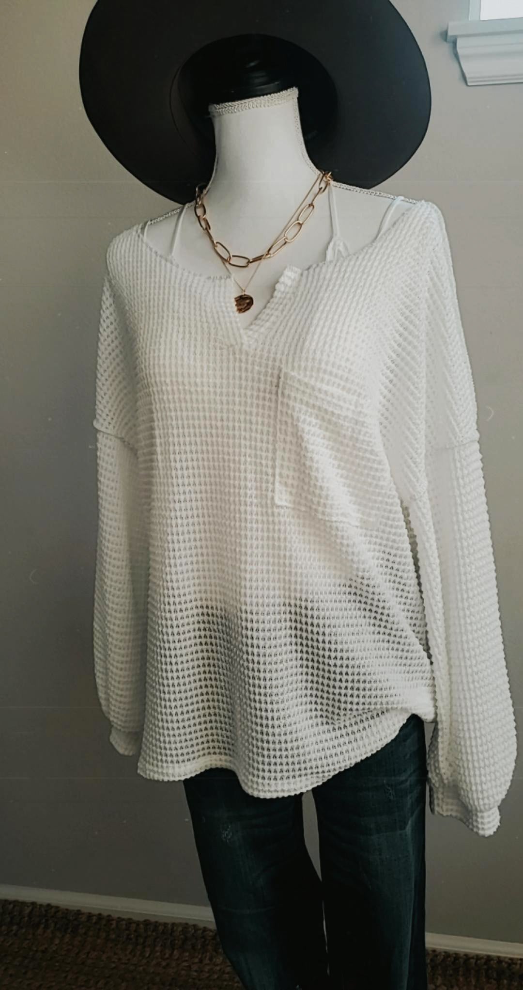 OVERSIZED WAFFLE KNIT TOP WITH BUBBLE SLEEVES AND FRONT PATCH POCKET