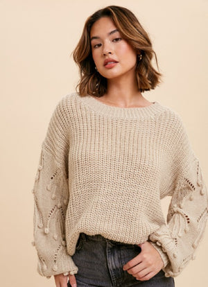 CREAM KNITTED SWEATER WITH POM DETAIL