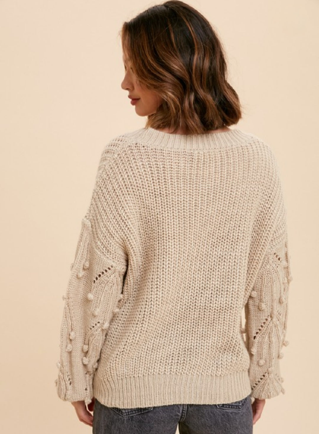 CREAM KNITTED SWEATER WITH POM DETAIL