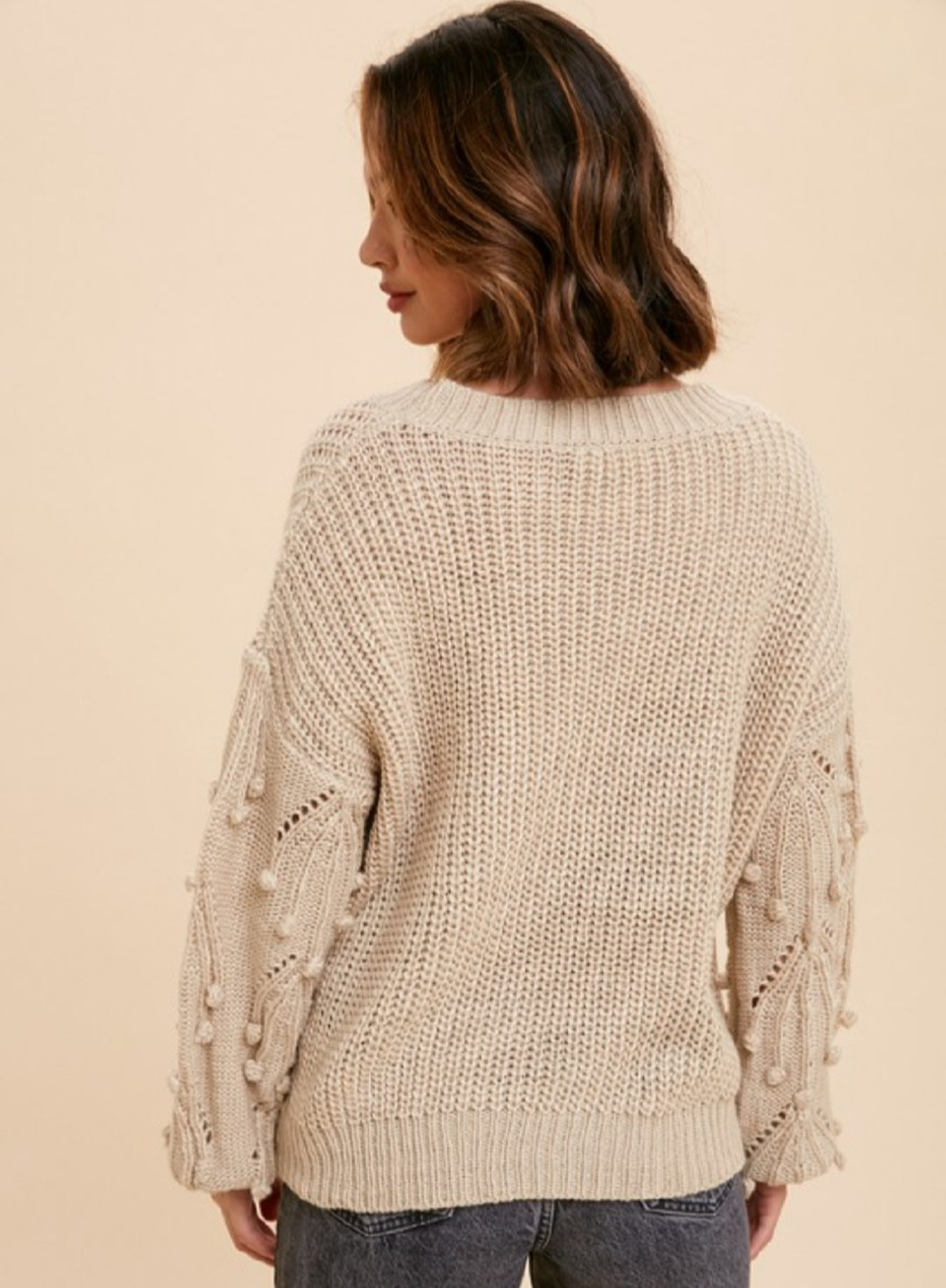 CREAM KNITTED OVERSIZED SWEATER WITH POM DETAIL